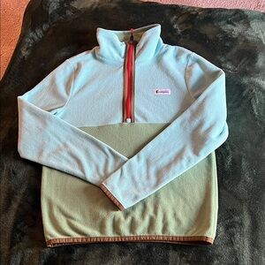 Cotopaxi woman’s Light Blue and Olive fleece